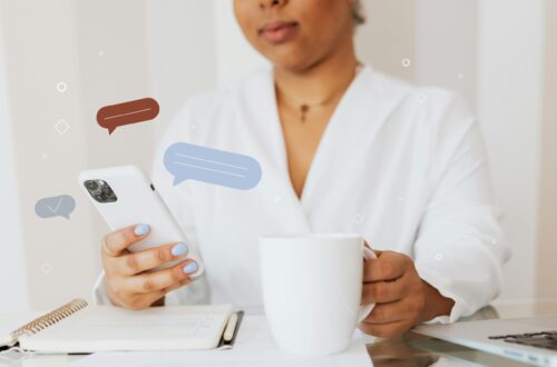 A woman reading a text message